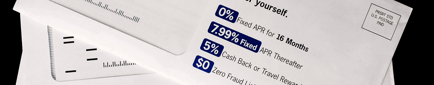 An white mailing envelope that lists the proposed benefits of a credit card offer inside the envelope