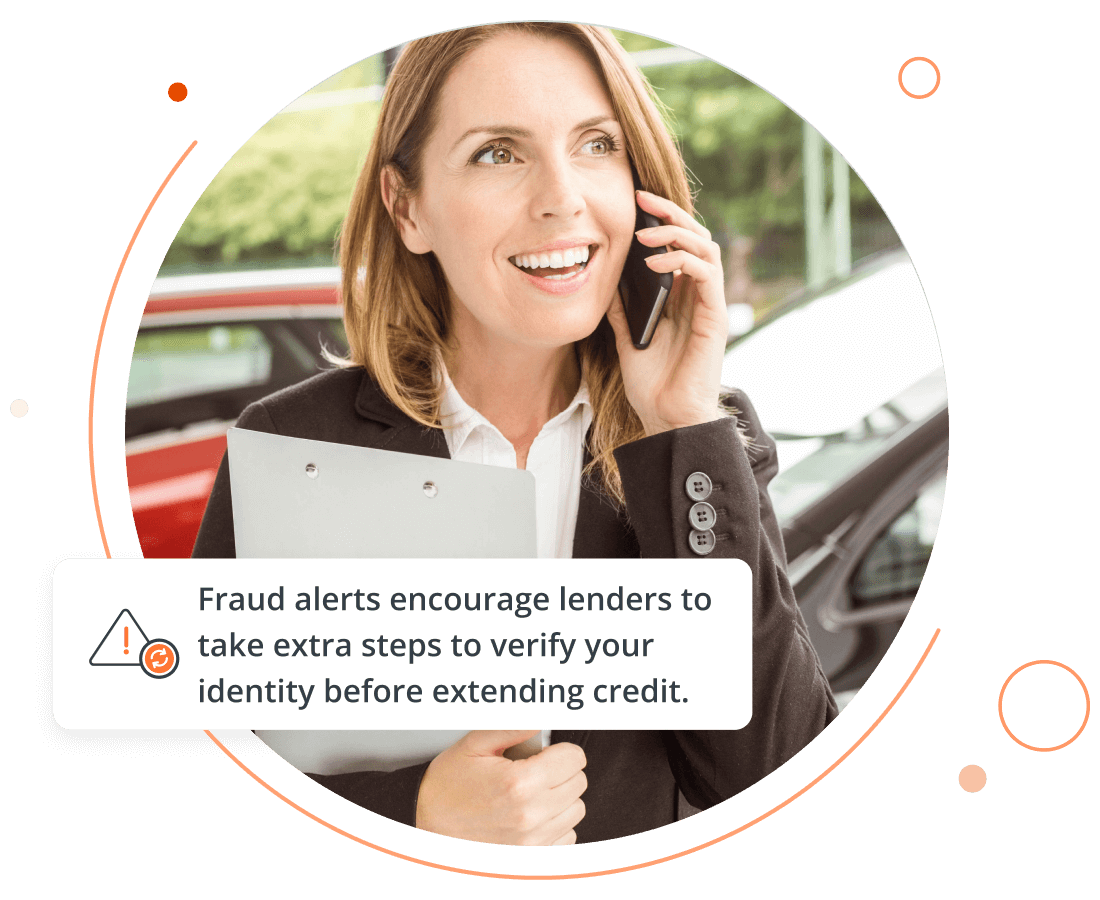 woman holding a clip board talking on her telephone