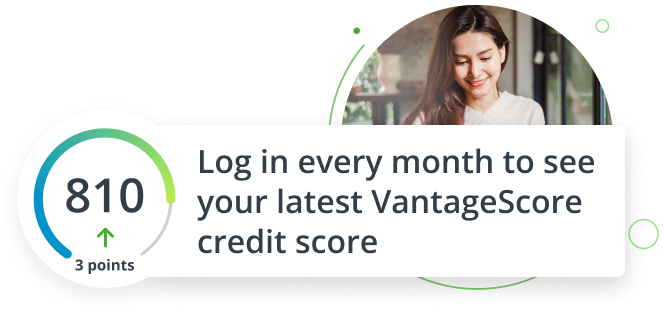 Young woman smiling while looking at her cell phone