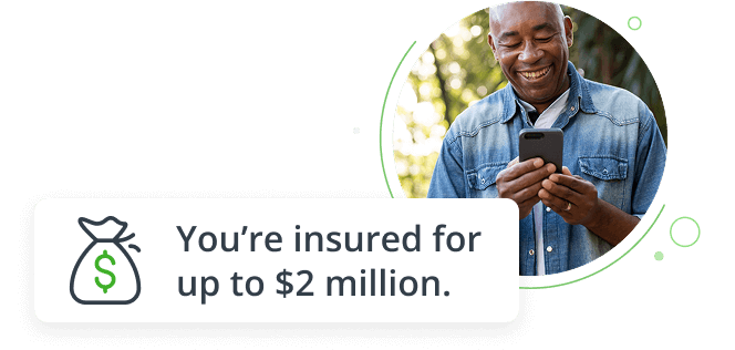 man looking at something on his cell phone and smiling