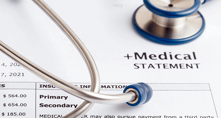 Close-up on a medical statement and stethoscope