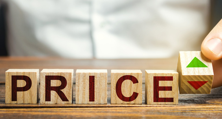 Blocks with letters spell “PRICE”. One to the side is being flipped from a side with a red down arrow to a green up arrow.