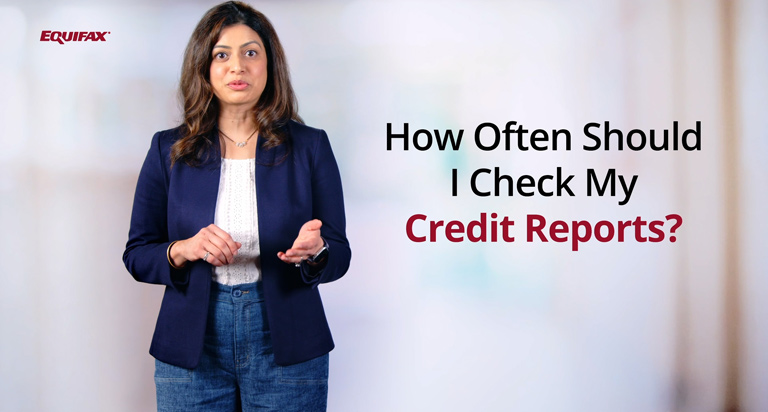 A woman with dark hair and a blue jacket stands with the text “How Often Should I Check My Credit Reports” beside her.