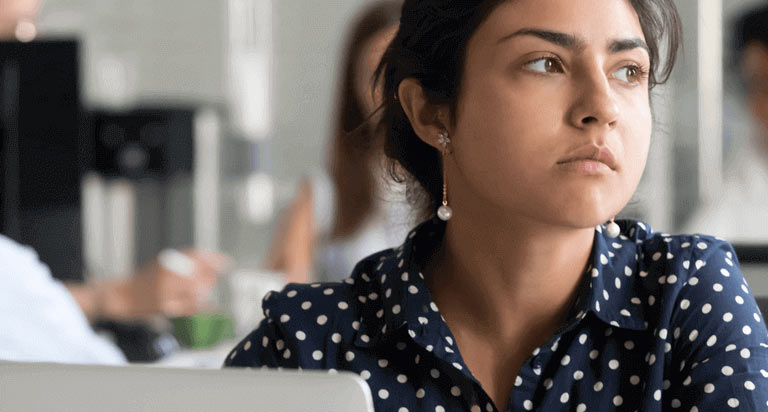 A woman staring off to her left